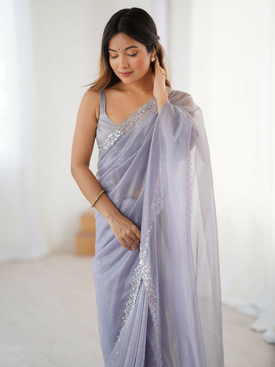 Lavender Embellished Border Sequinned Net Saree with Blouse Piece