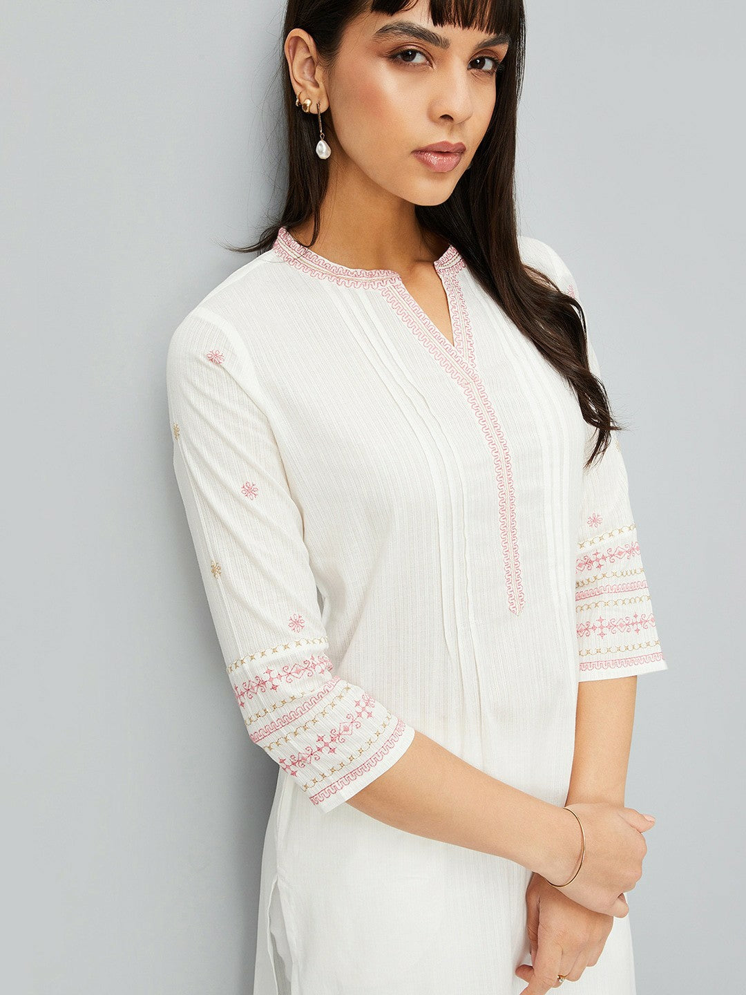 Off-White Embroidered Cotton Kurta for Women | Three-Quarter Sleeves, Asymmetric Hem | IndiaIsta