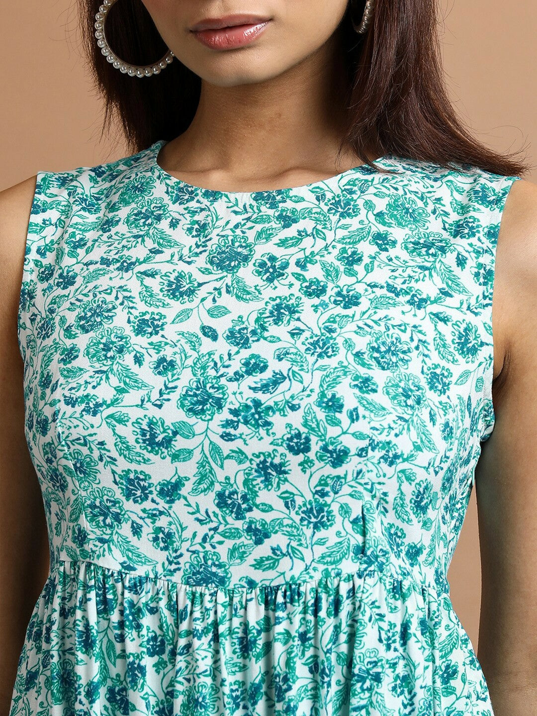 Women’s Green Floral Printed Peplum Top – Sleeveless, Round Neck, Viscose Rayon | Indiaista