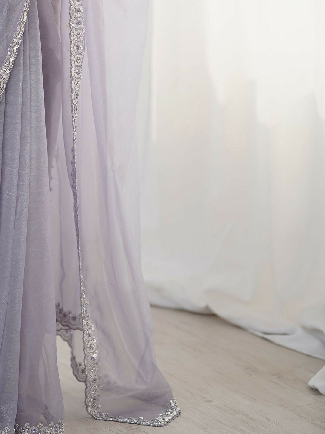 Lavender Embellished Border Sequinned Net Saree with Blouse Piece