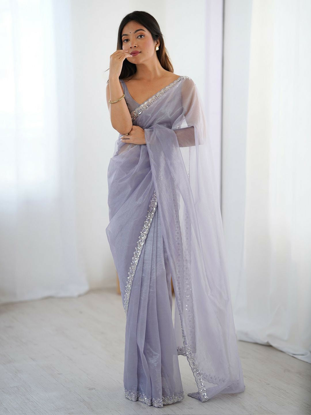 Lavender Embellished Border Sequinned Net Saree with Blouse Piece