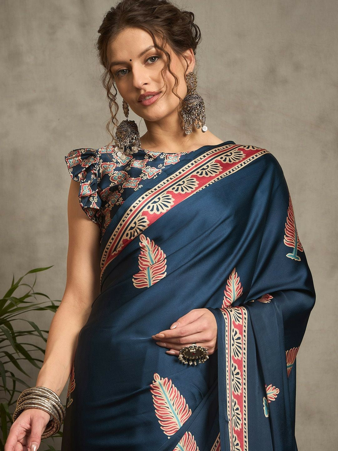 Teal & Red Block Print Saree with Ethnic Motifs and Printed Border