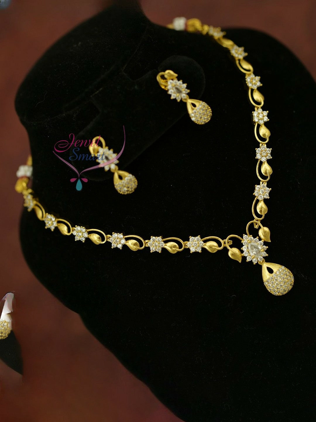 Gold-Plated Cubic Zirconia Studded Necklace & Earring Set