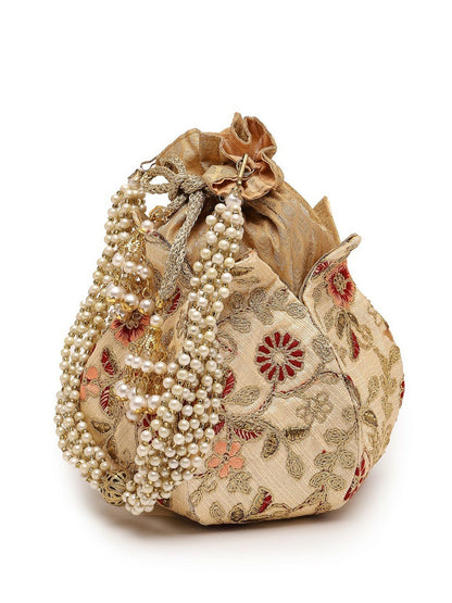 Buy Beige & Gold-Toned Pearl Embellished Potli Bag with Tassels | Indiaista