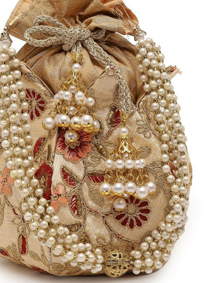 Buy Beige & Gold-Toned Pearl Embellished Potli Bag with Tassels | Indiaista