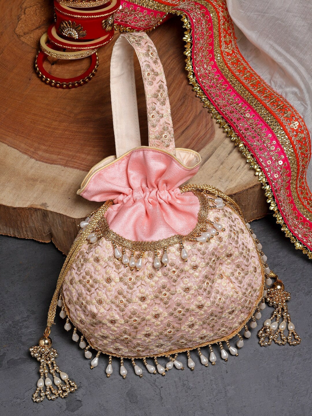 Buy Pink & Gold Embroidered Tasselled Potli Bag Online – Indiaista