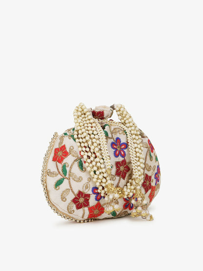 Buy Elegant Cream & Purple Embroidered Potli Clutch | Indiaista